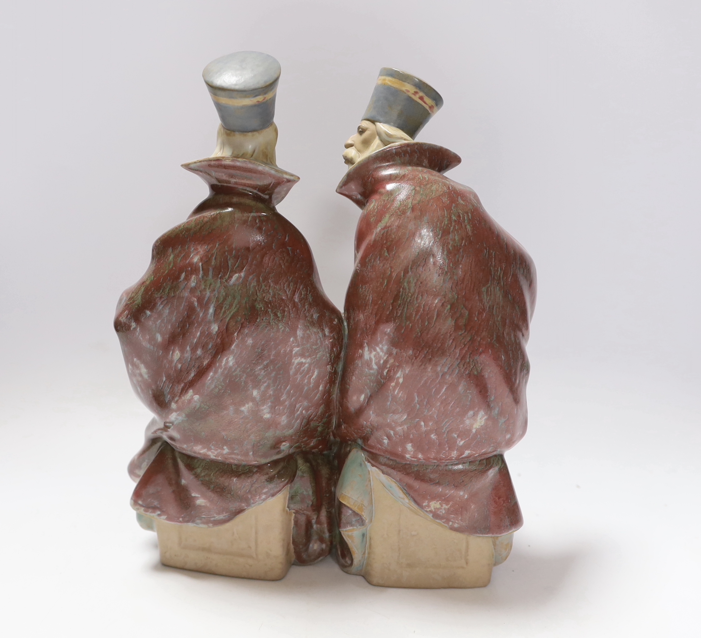 A Lladro stoneware group of two priests, 29cm